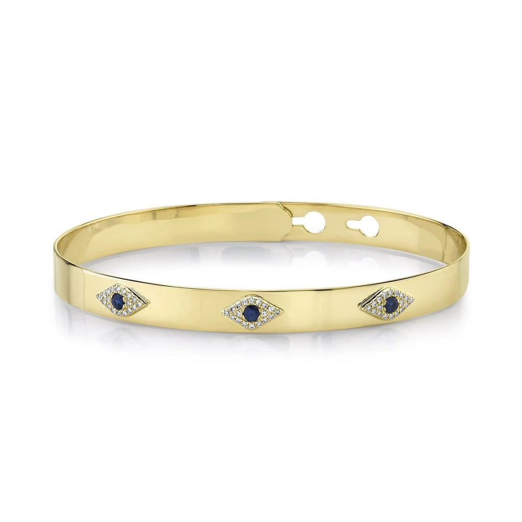 A Diamond & Sapphire Evil Eye Bangle at Pasha Fine Jewelry