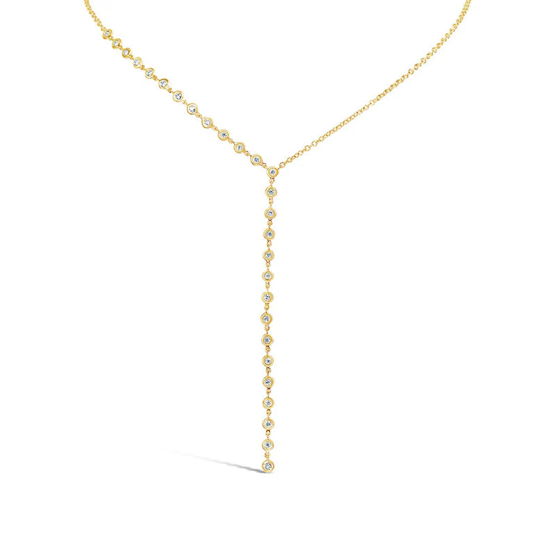 Gold necklace with small diamonds on a white background